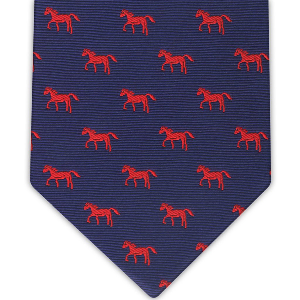 Corbata seda azul marino con estampado de caballos rojos