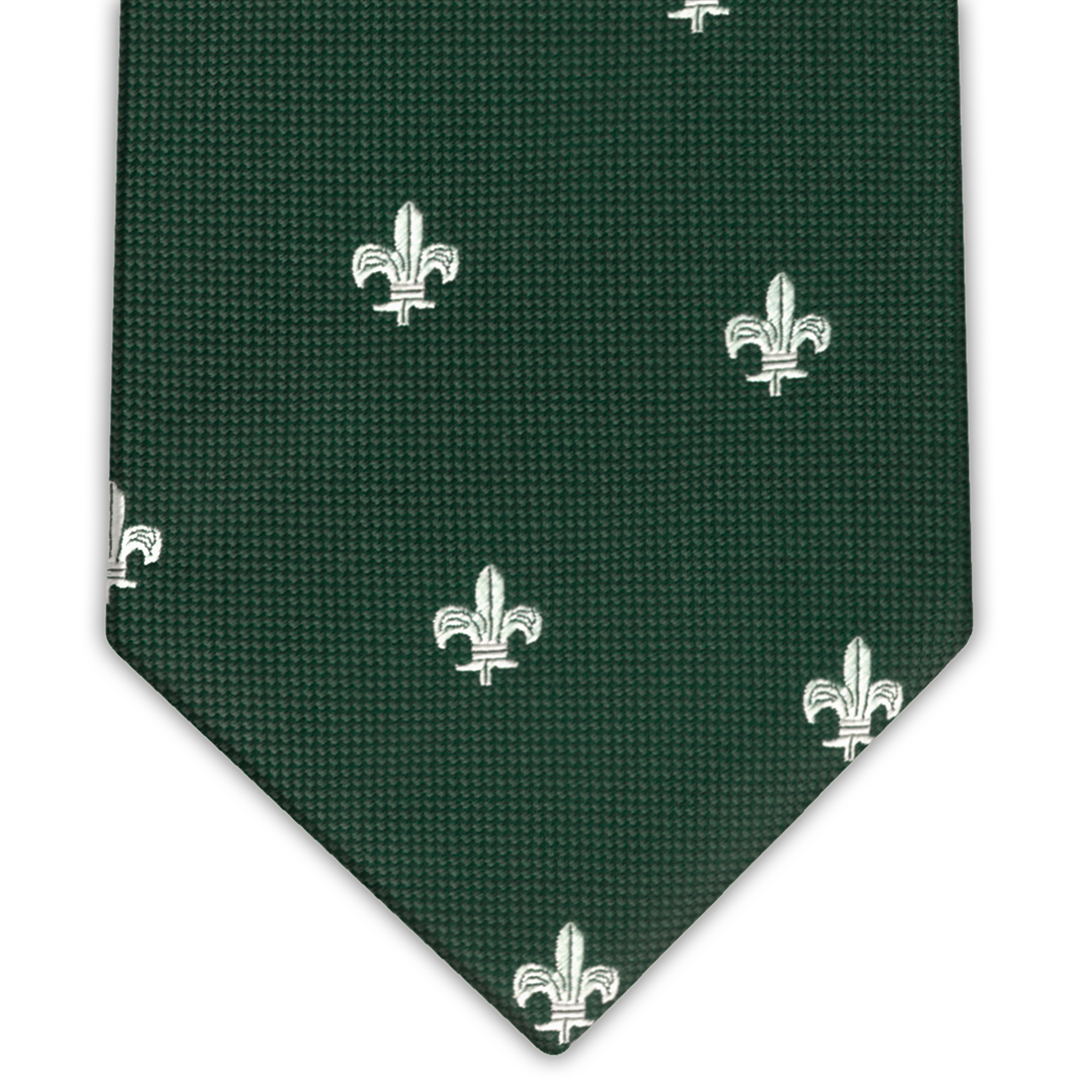 corbata confeccionada en color verde oscuro con diseño de flor de lis blancas