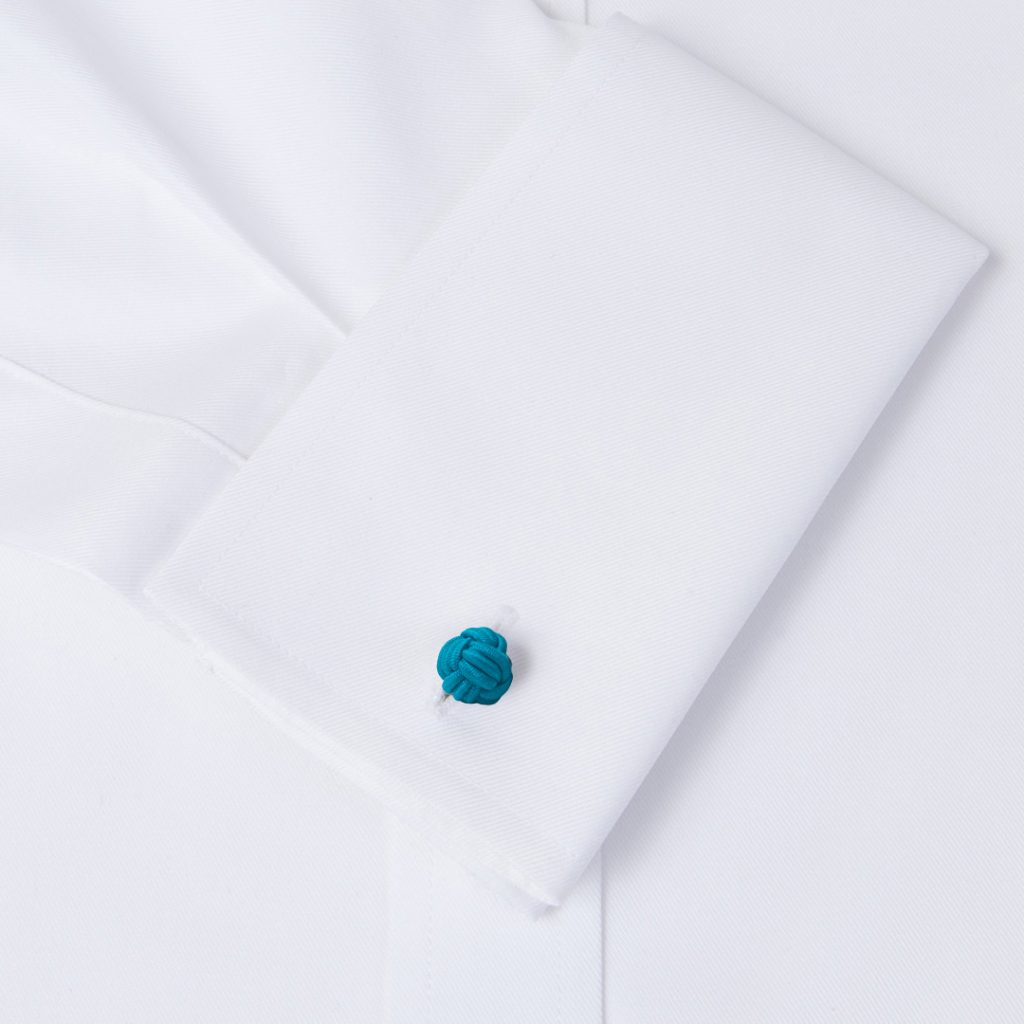 gemelos de pasamanería elasticos forma de bola en color azul bondi