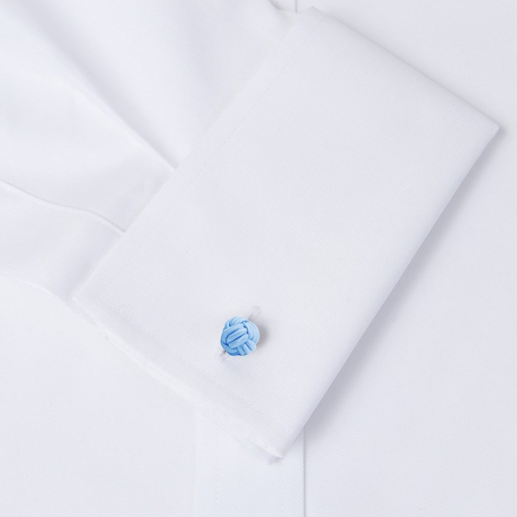 gemelos de pasamanería elasticos forma de bola en color azul cielo