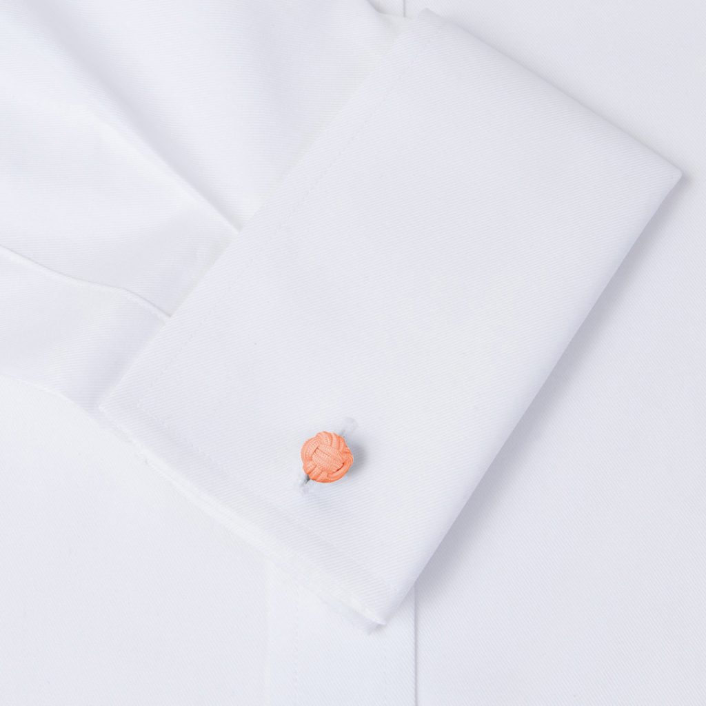 gemelos de pasamanería elasticos forma de bola en color salmon